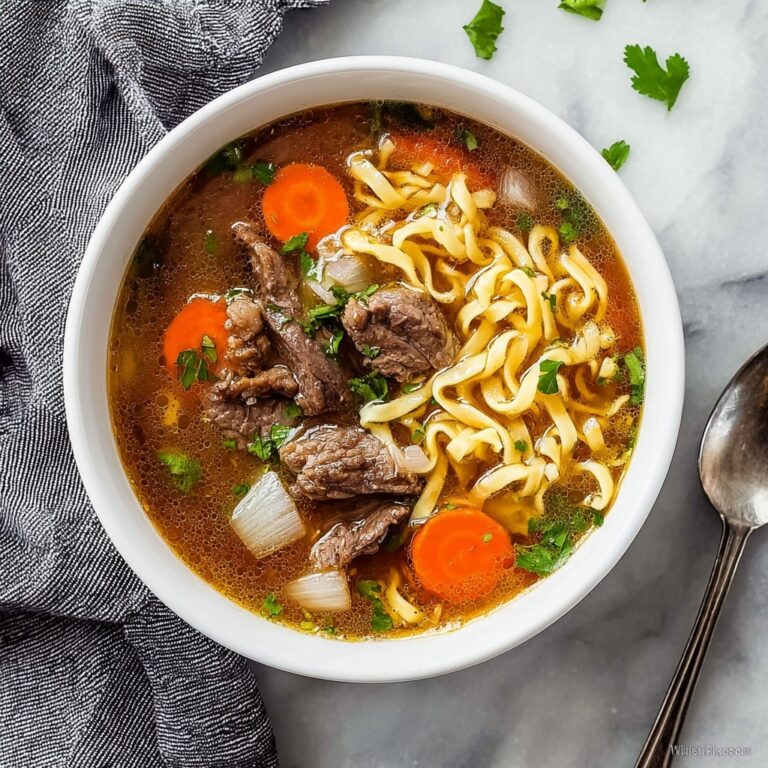 Hearty Beef Noodle Soup with Garlic, Vegetables, and Balsamic Vinegar Recipe